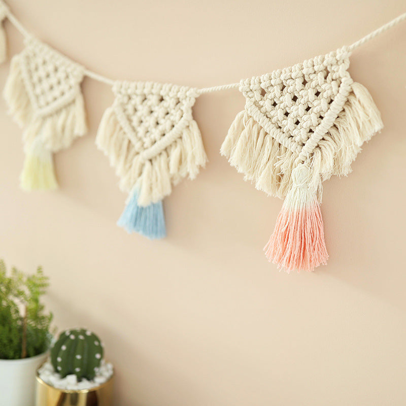 Macrame garland with hand-knotted triangle pendants and colorful cotton tassels