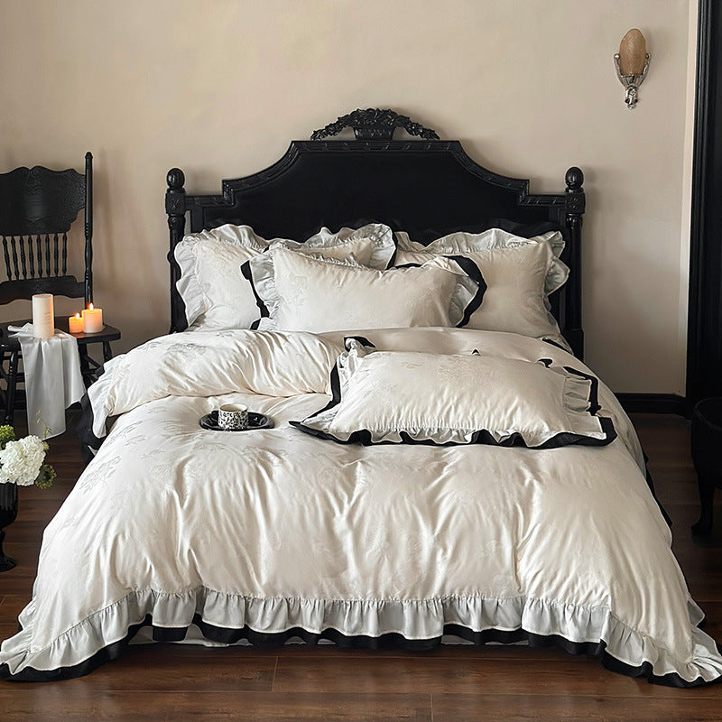 Luxurious cotton satin bedding set with decorative ruffle and contrasting edge finishing