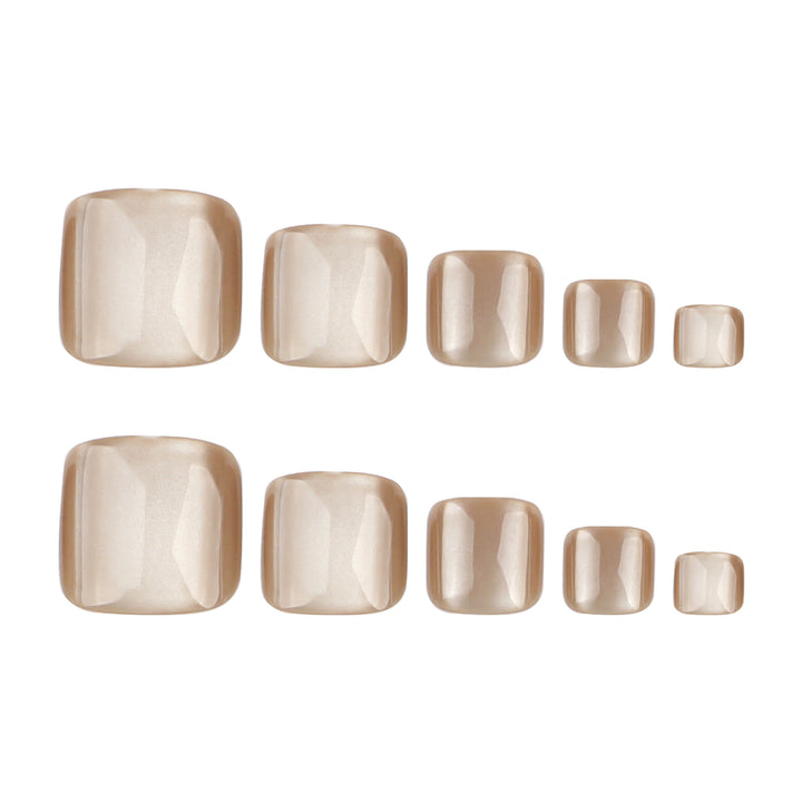 Artful nail art with glitter accents and soft ombre effect Kalsten