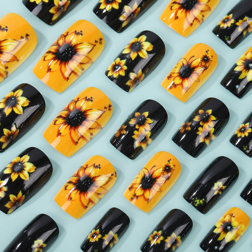 Artificial nails in floral design with sunflower motif Kalsten