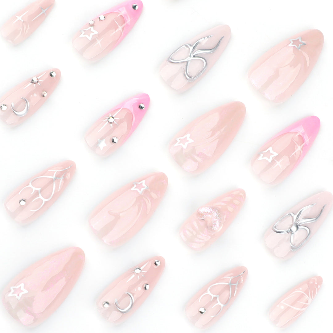 Artful nail art with filigree designs and glitter accents Kalsten