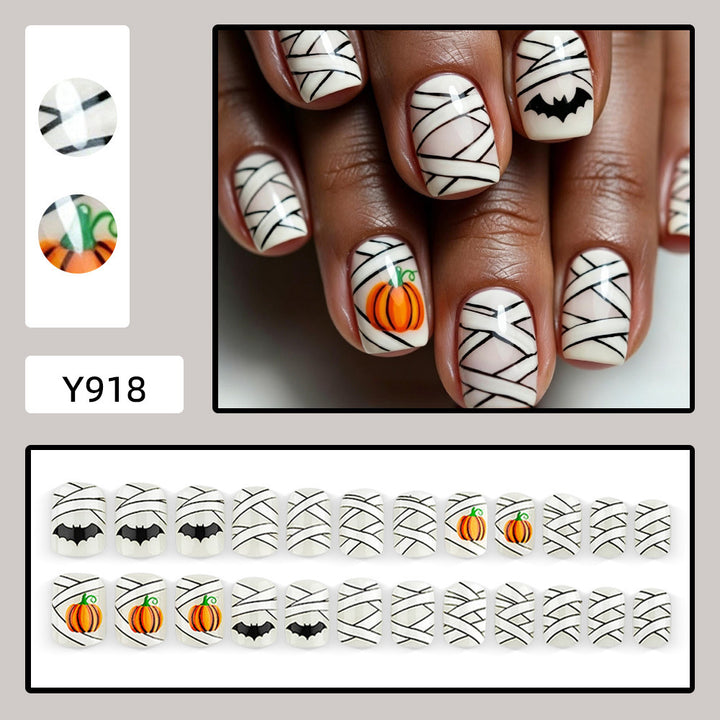 Creative Halloween Nail Art with Pumpkin and Bat Design Kalsten