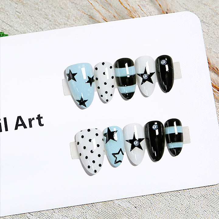 Artificial nails with trendy star and dot designs Kalsten