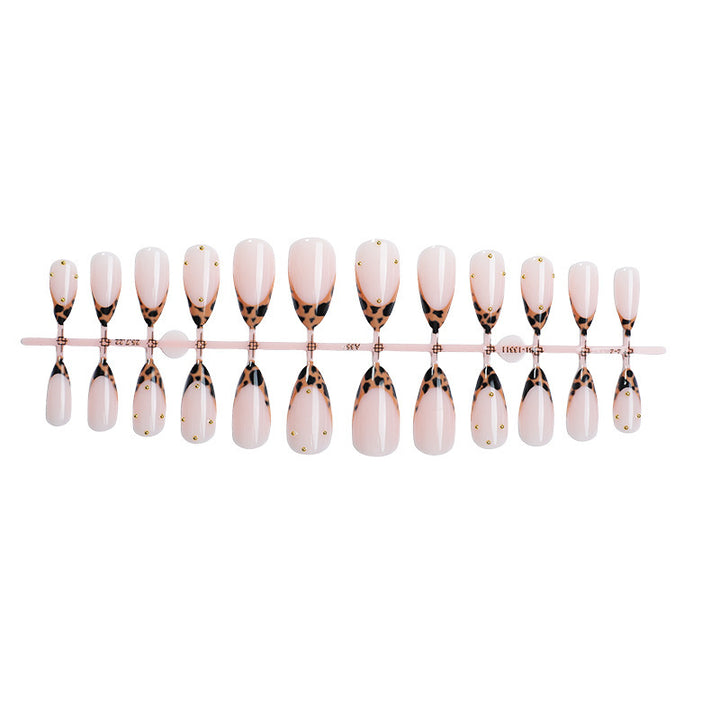 Acrylic nail set with elegant leopard design and gold accents Kalsten