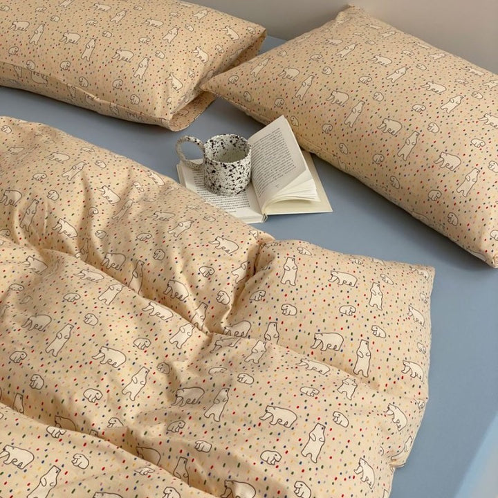 Light cotton bedding set with quilted topper and fine stripe pattern