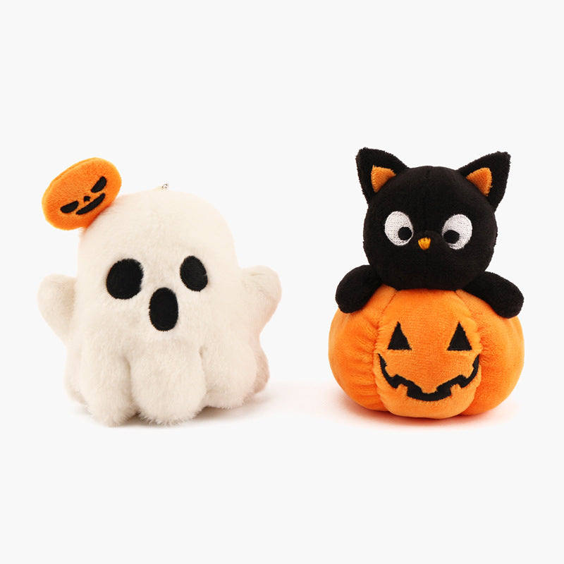 Plush figure cat on pumpkin with embroidered face