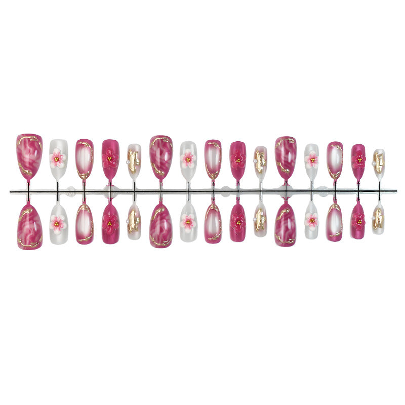 Acrylic nail set with floral accents and glitter details Kalsten