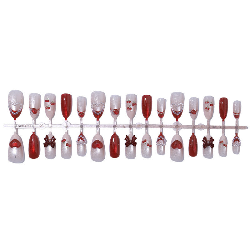 Artificial nail set with romantic heart and glitter decorations Kalsten