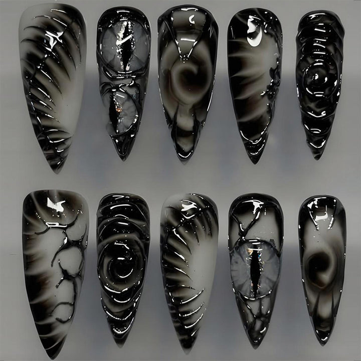 Artificial nail set with modern spiral pattern and shiny accents Kalsten
