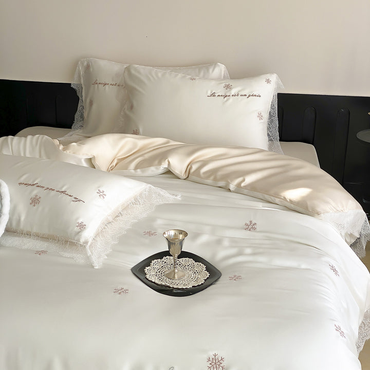 Luxurious satin bedding set with lace trim and snowflake embroidery