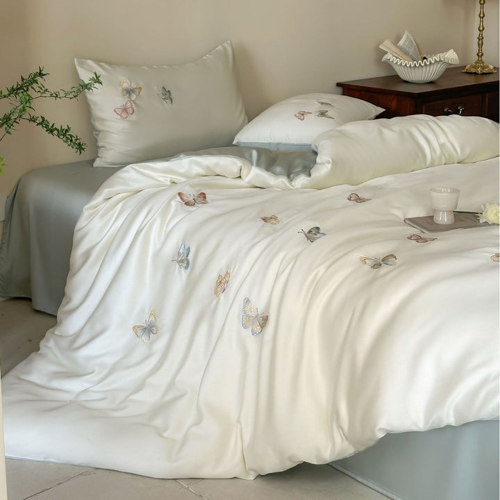 Luxury satin duvet cover set with embroidered butterfly appliqués
