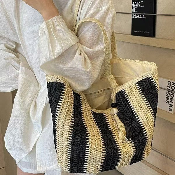 Braided beach bag with decorative tassel pendant Kalsten