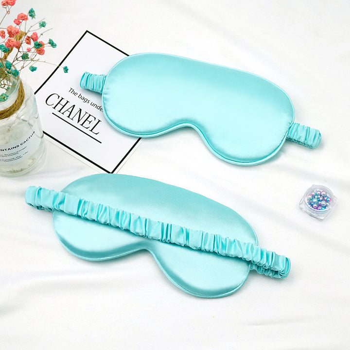 Women's breathable satin eye mask with ergonomic curvature, soft padding and gathered anti-slip band Kalsten