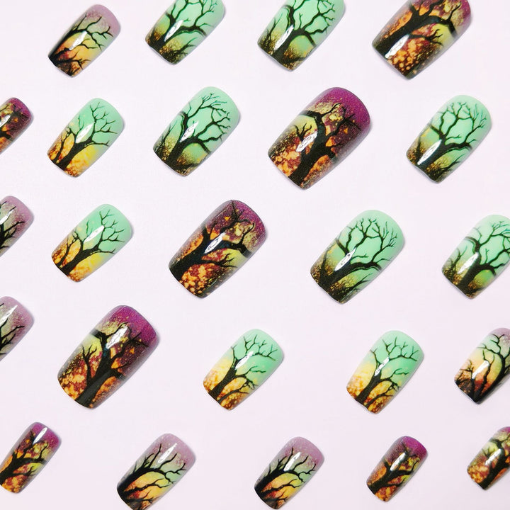 Artificial nails with fascinating tree silhouette design Kalsten