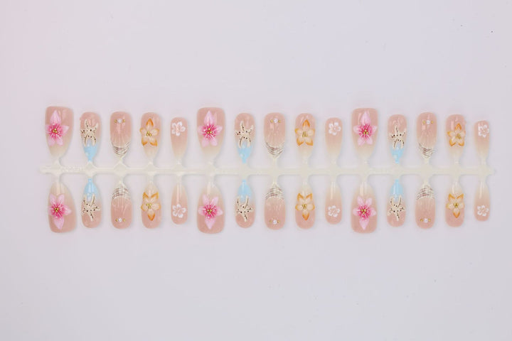Artificial nail set with floral motifs and radiant accents Kalsten