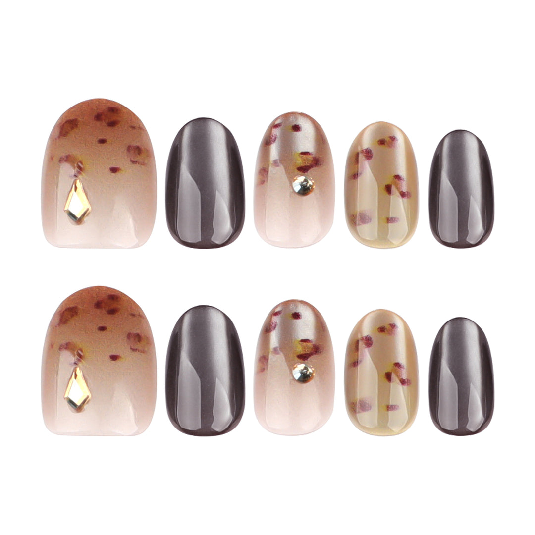 Artistic nail art with glitter accents and elegant design Kalsten