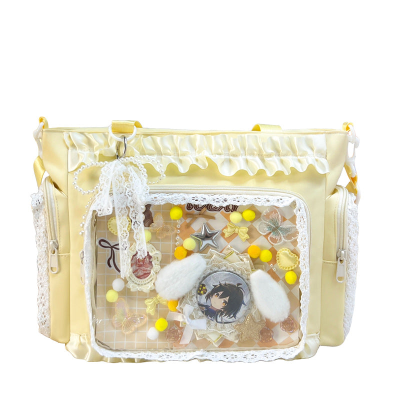 Shoulder bag with transparent front and playful applications Kalsten