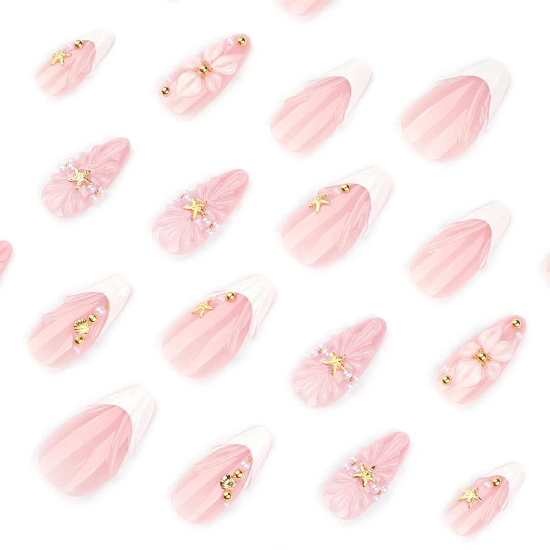 Artful nail art with shell and flower accents Kalsten
