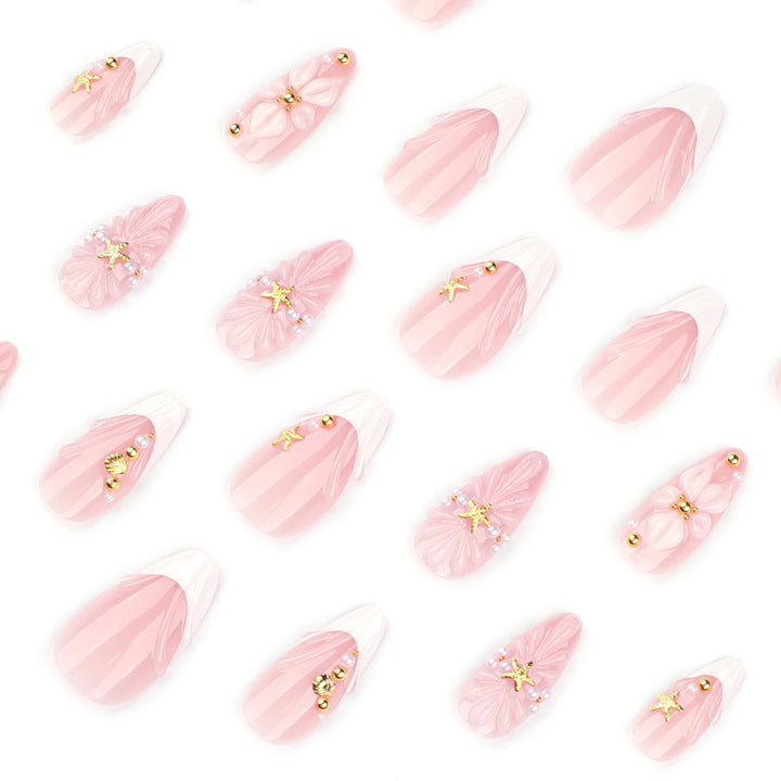 Artful nail art with shell and flower accents Kalsten