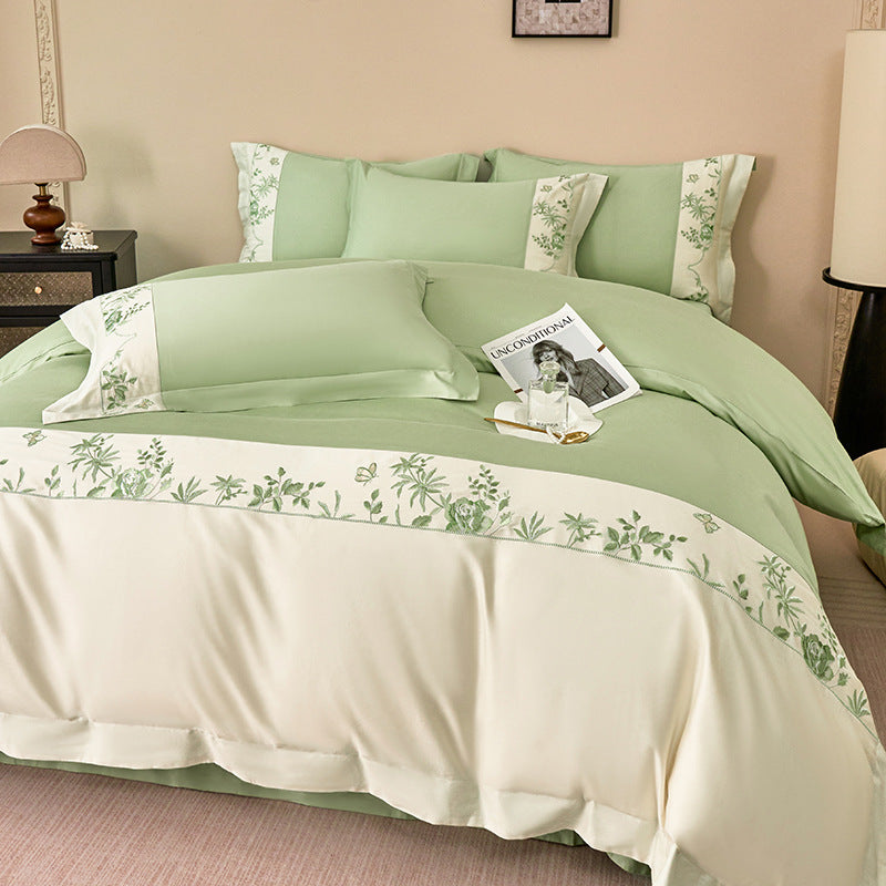 Luxurious bedding set with embroidered border and satin look
