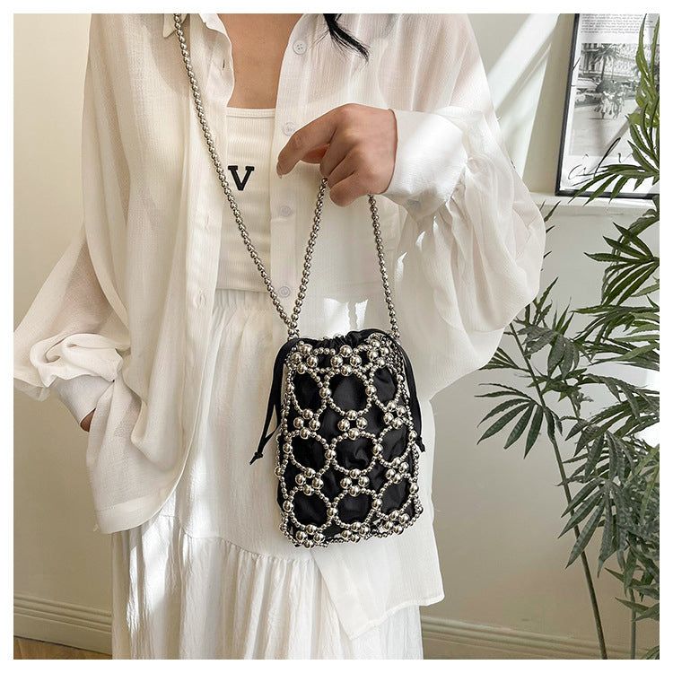 Elegant Pearl-Embellished Drawstring Handbag