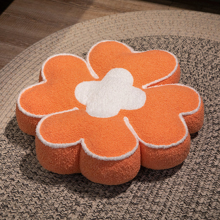 Padded seat cushion in flower shape with faux leather center piece and fluffy edge padding