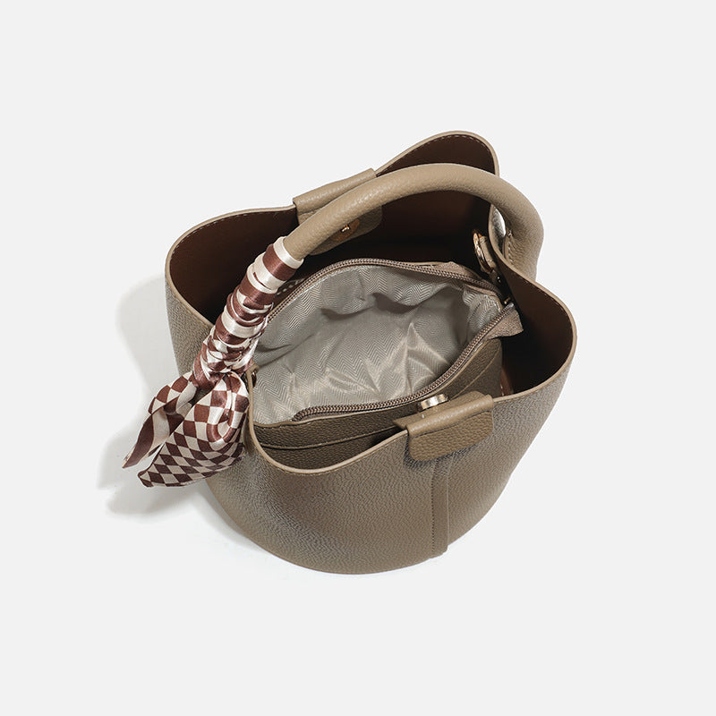 Chic Handheld Bucket Bag with Braided Accent