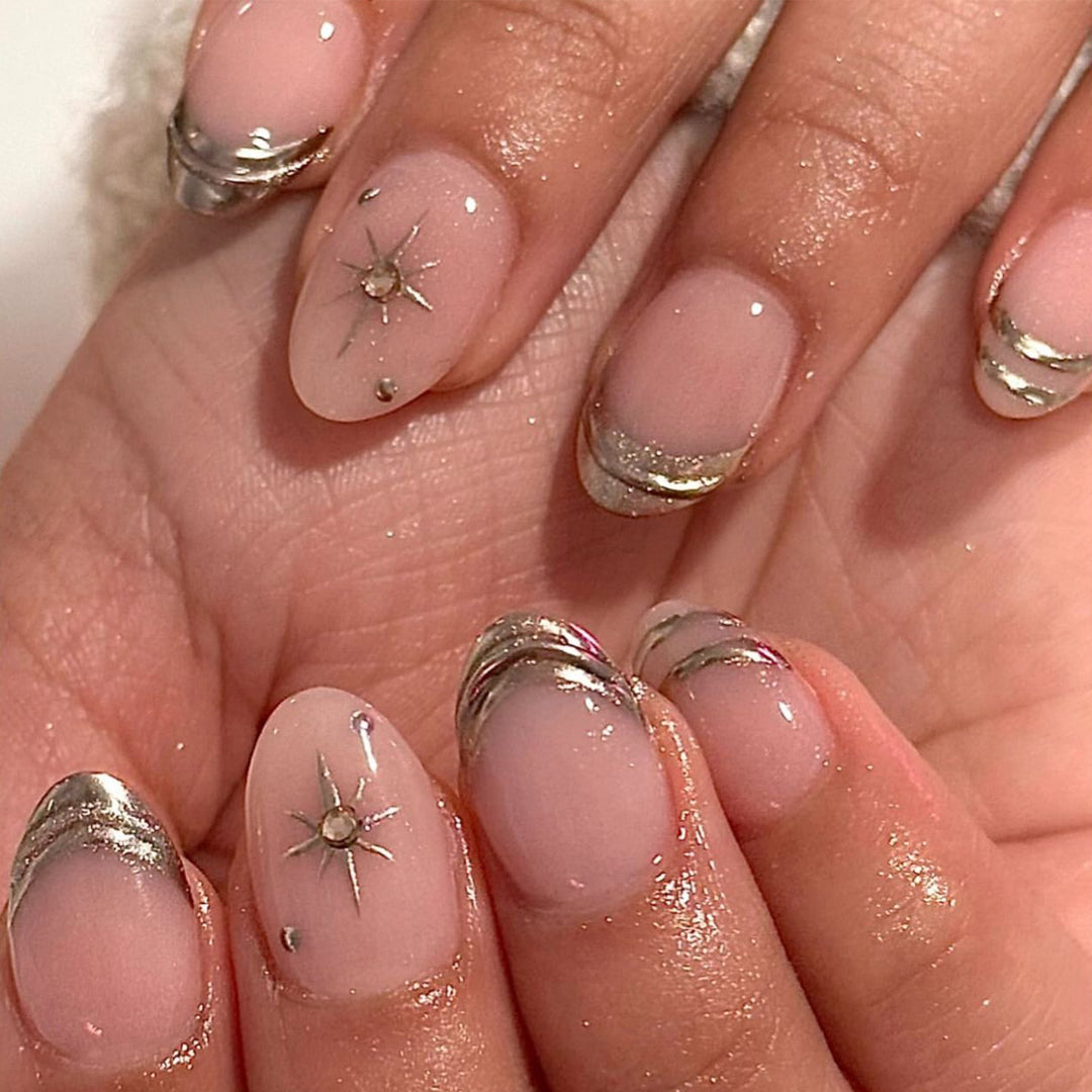 Glamorous nail extensions with elegant metallic accents Kalsten