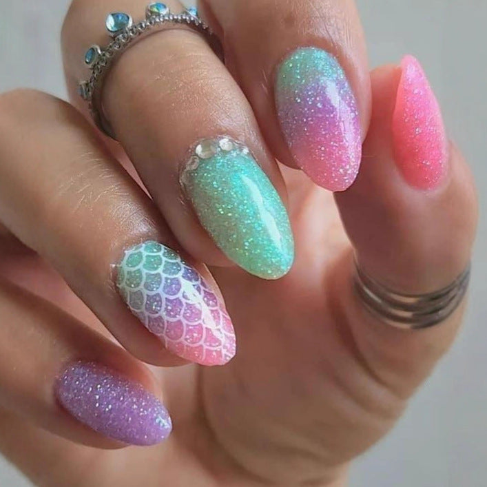 Creative glitter art nails with colorful gradient and scale design Kalsten