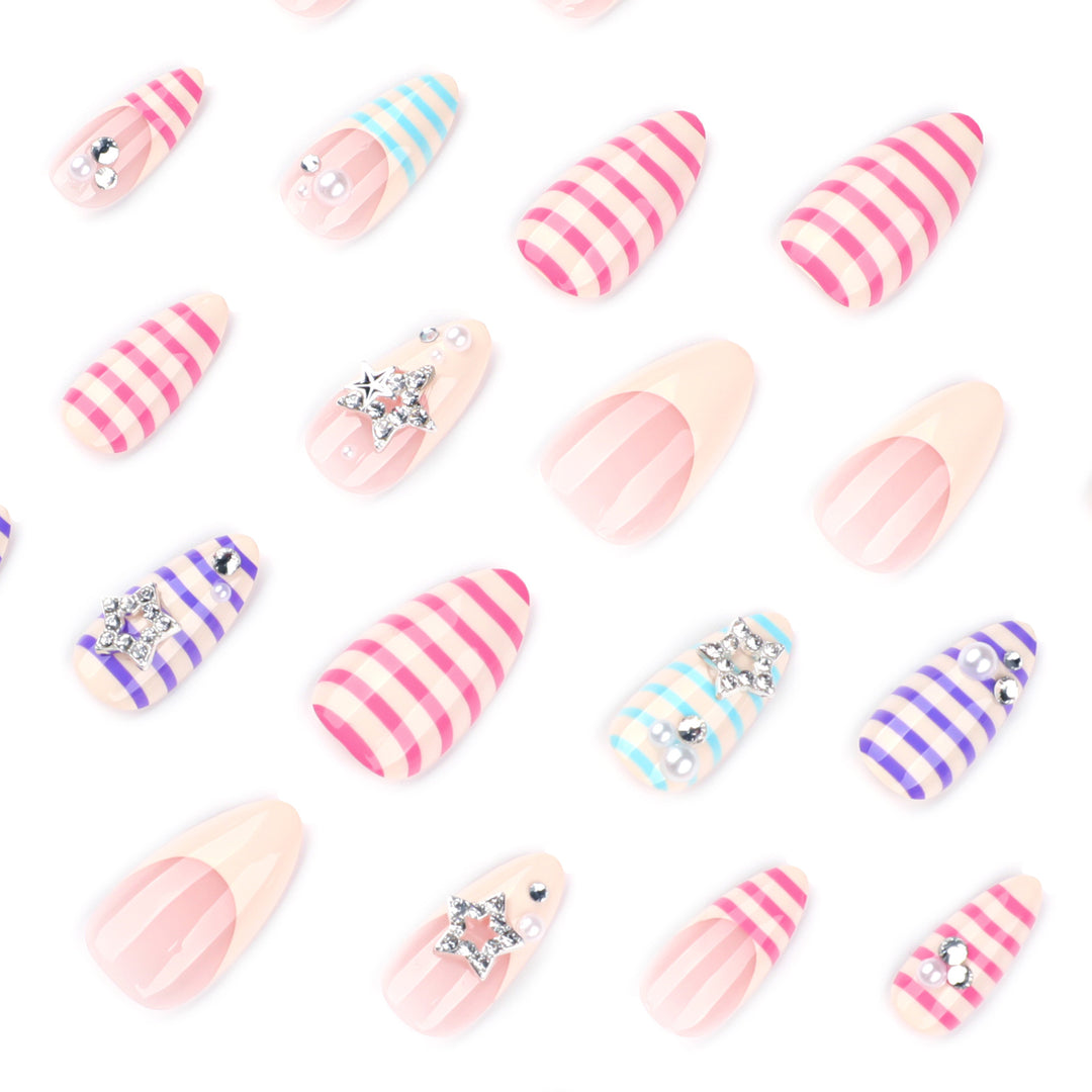 Artistic acrylic stiletto nails with glitter and star embellishments Kalsten