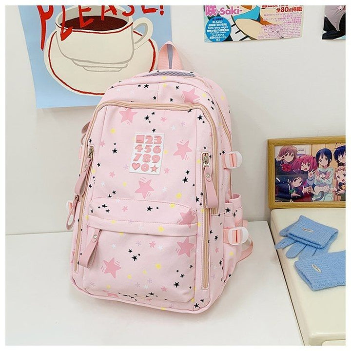 Playful backpack with star motifs and practical functions Kalsten