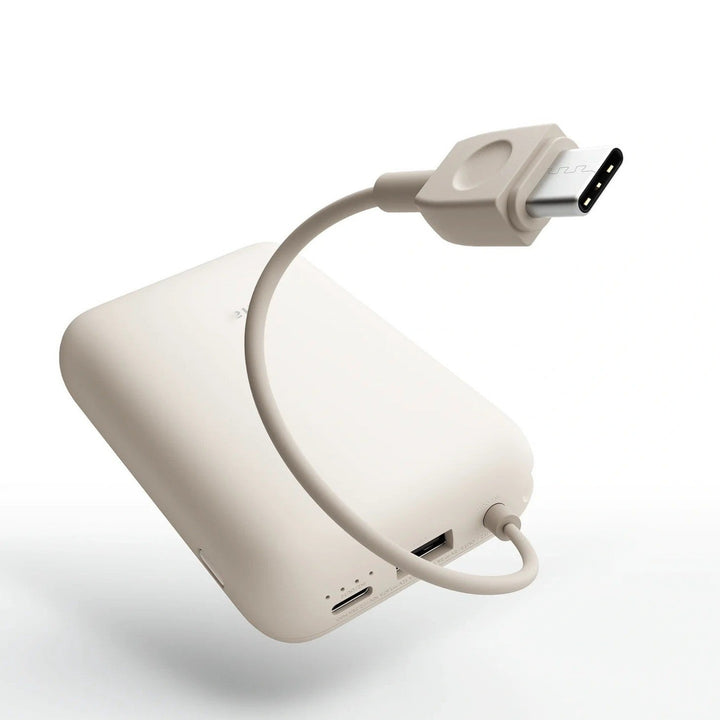 Compact High-capacity portable power bank with integrated USB-C cable and silicone carry loop Kalsten