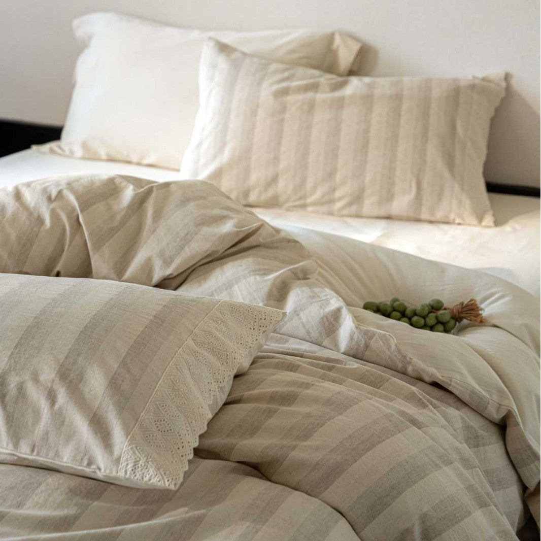 Bedding set with polka dot dobby texture and eyelet embroidery frill