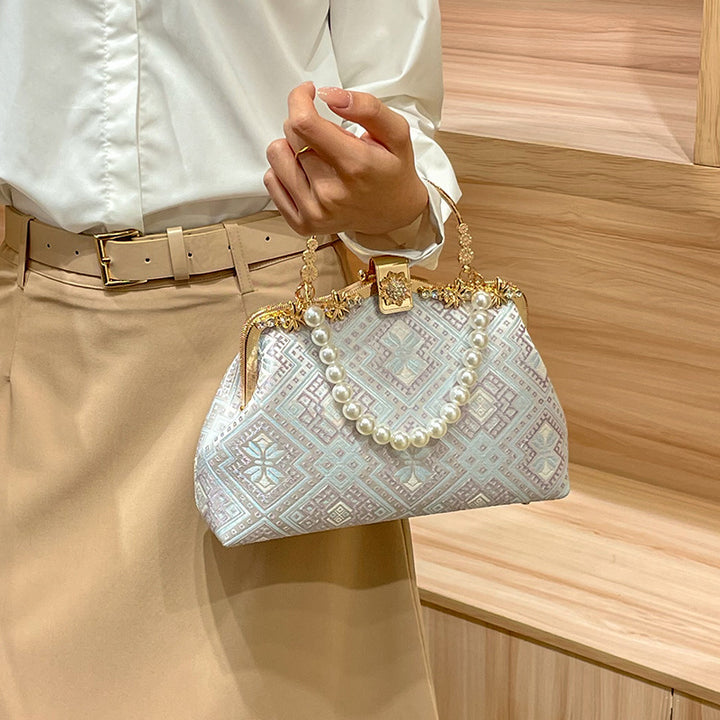 Elegant Pearl-Embellished Handbag