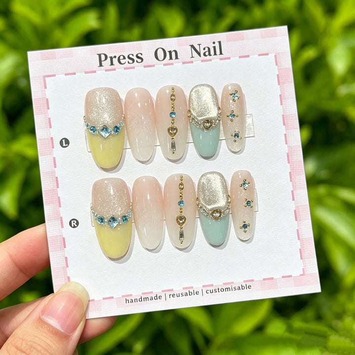 Artistic Press-On Nail Set with Heart and Gem Accents
