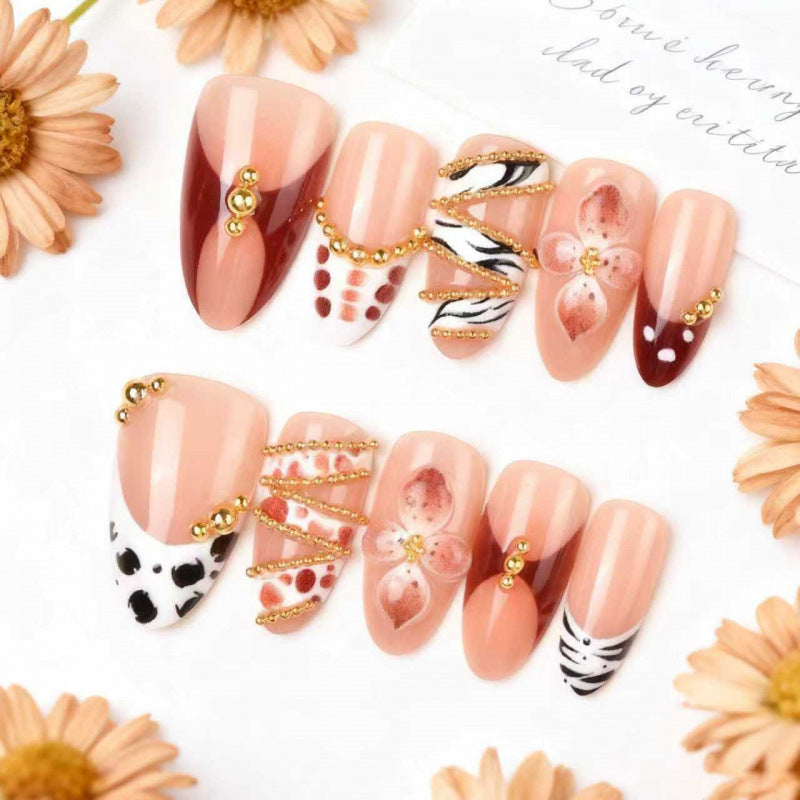 Artistic Press-On Nail Set with Floral and Gemstone Accents