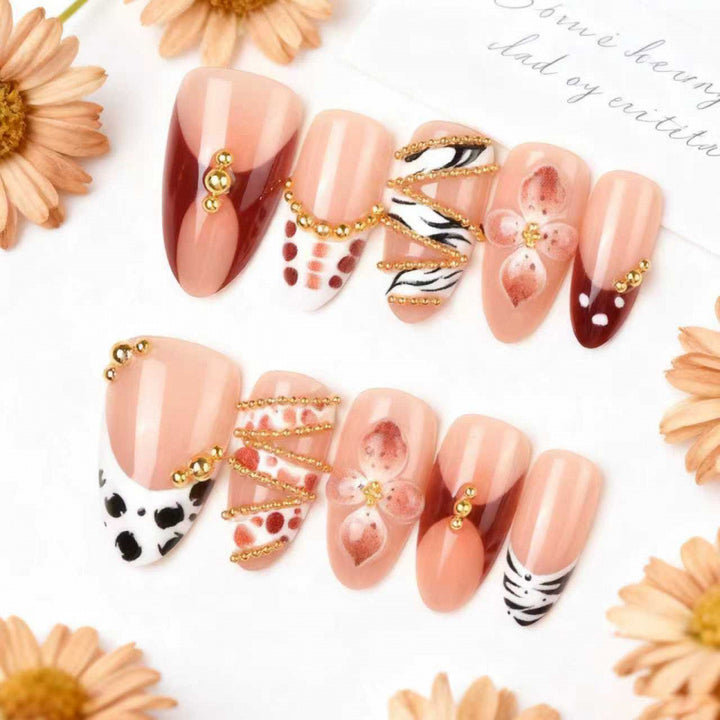 Artistic Press-On Nail Set with Floral and Gemstone Accents