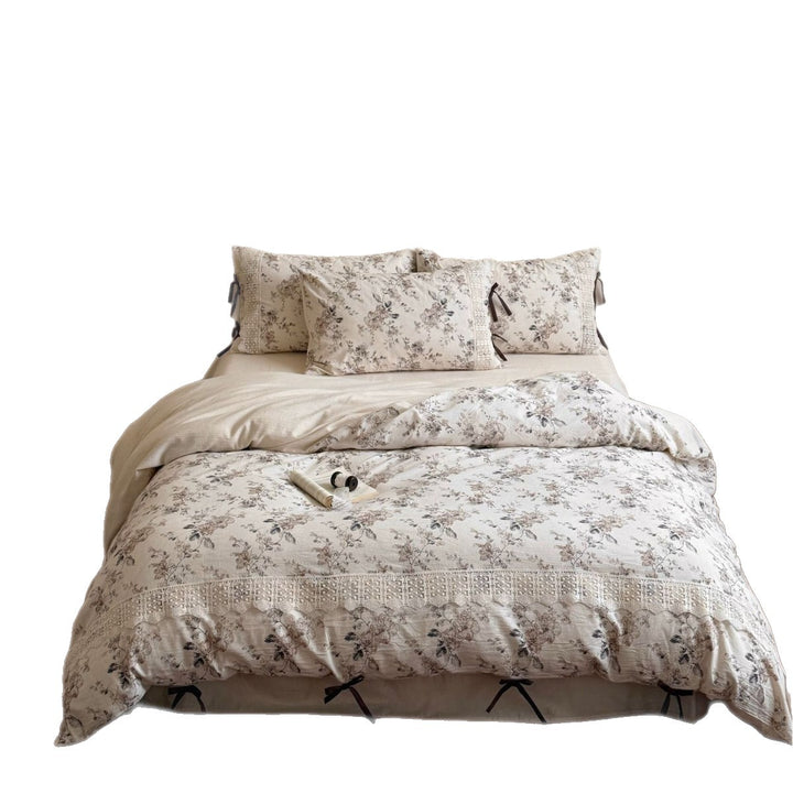 Romantic cotton-linen bedding set with lace trim and decorative ribbons