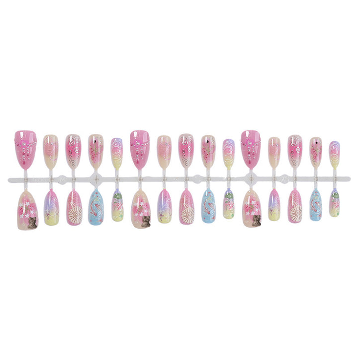 Creative nail art set with floral and playful designs Kalsten