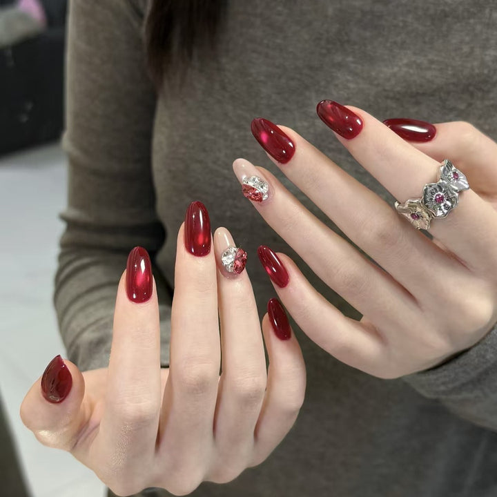 Elegant Press-On Nail Extensions with Decorative Gem Accents