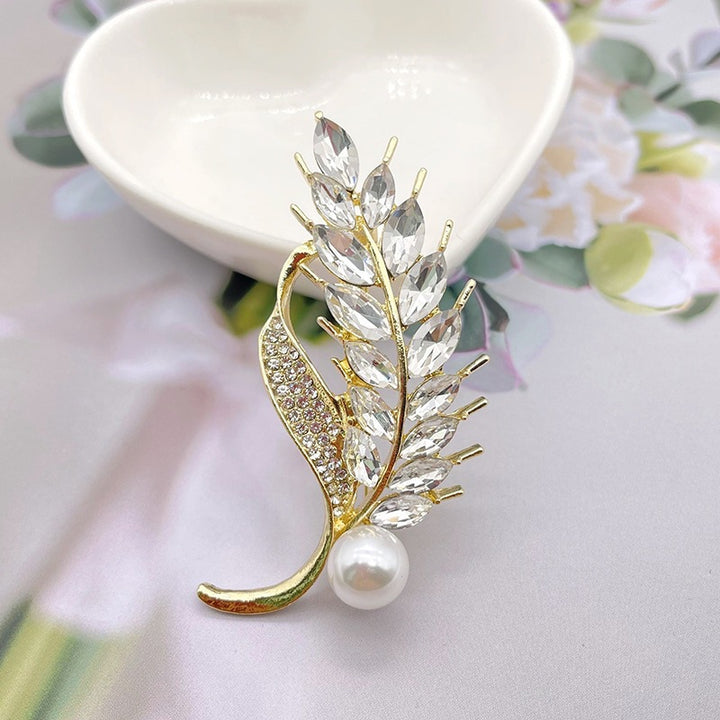 Elegant brooch with glitter stone and pearl Kalsten