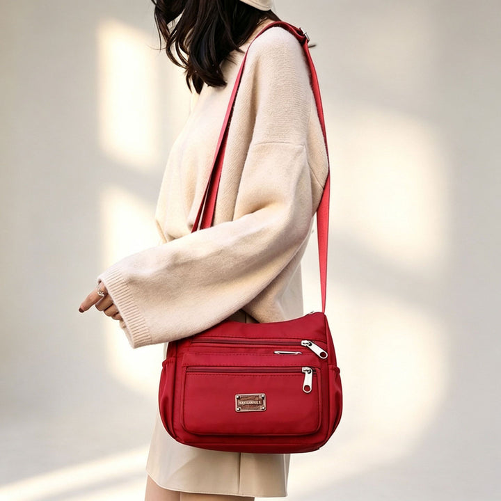 WoMulti-Pocket Crossbody Handbag