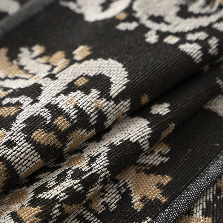Reversible jacquard scarf with ornamental woven pattern