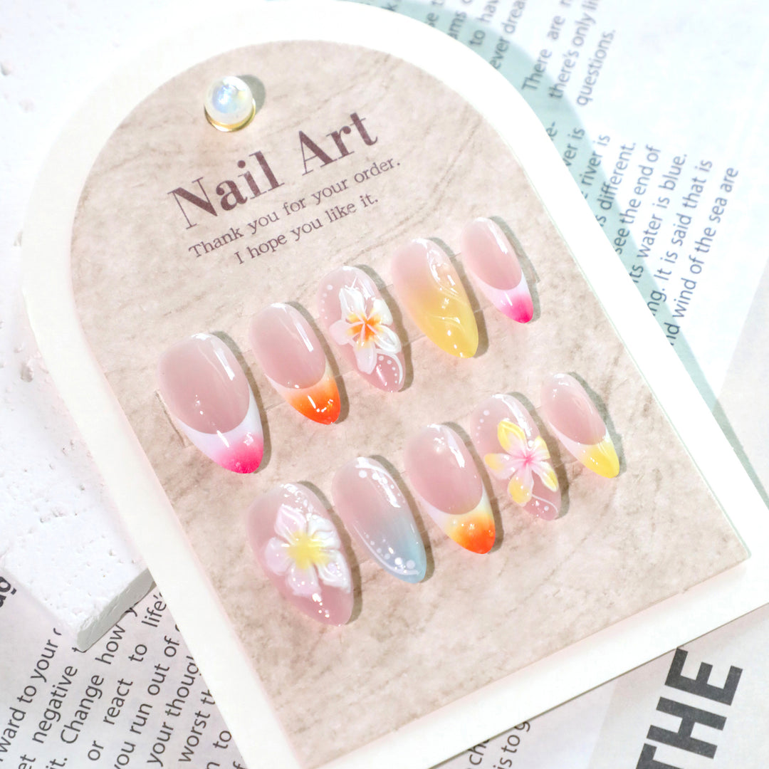 Artistic nail designs with floral accents and soft color gradients Kalsten