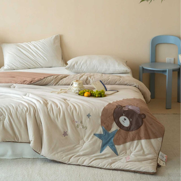 Children's quilt with cute bear appliqué and soft filling