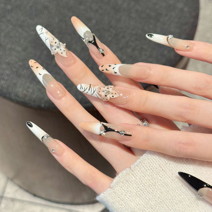 Artistic Press-On Nail Art Set with Unique Patterns and Gem Accents