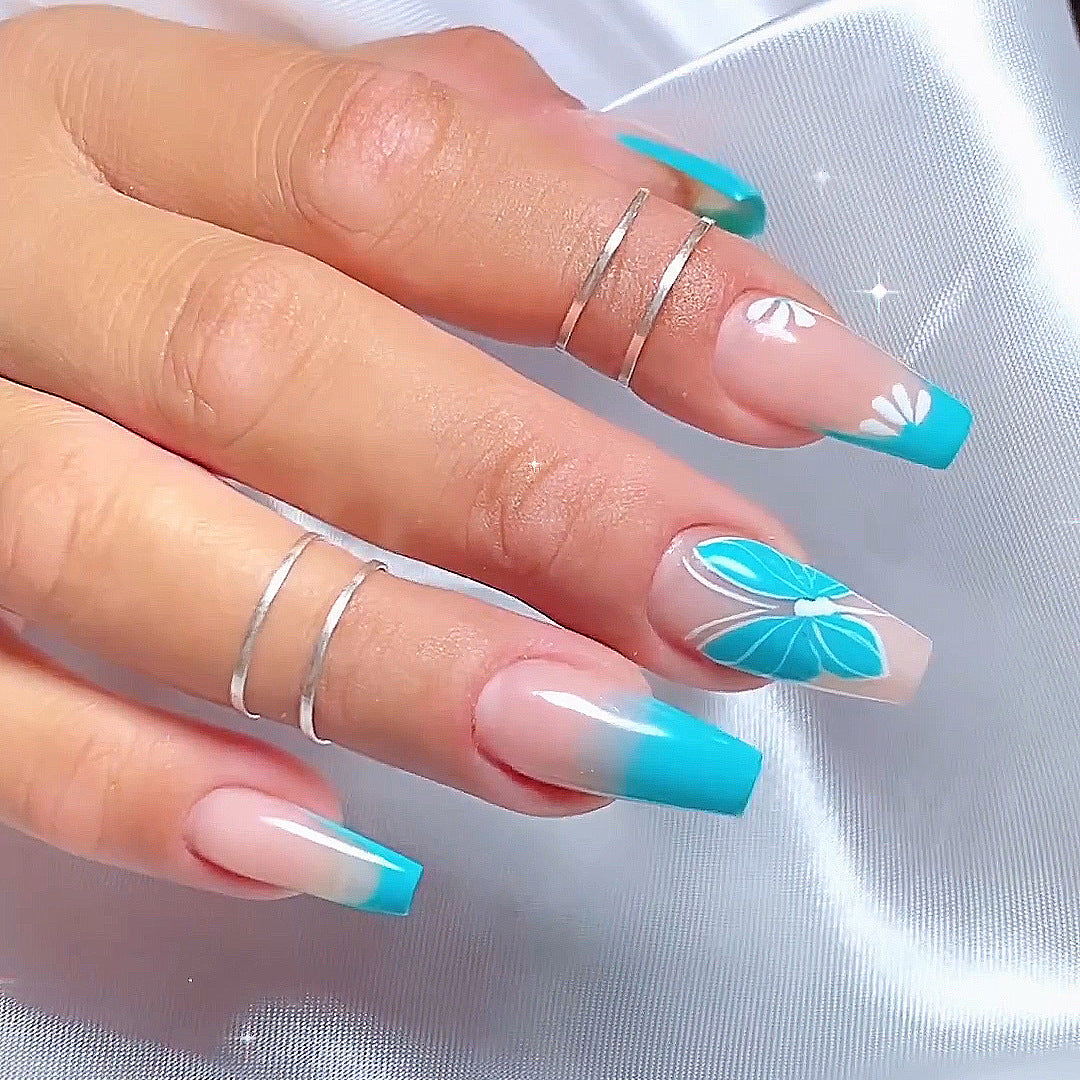 Artful nail art with ombre and flower decorations Kalsten