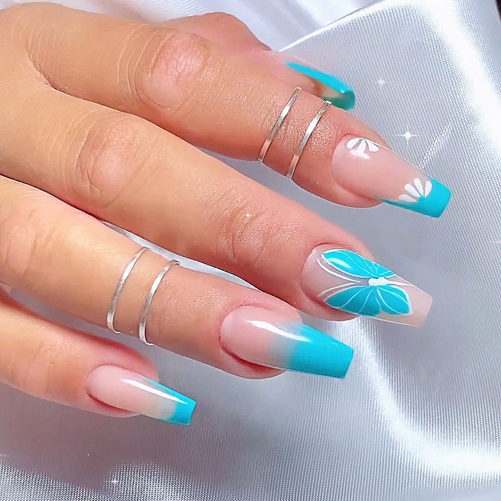 Artful nail art with ombre and flower decorations Kalsten