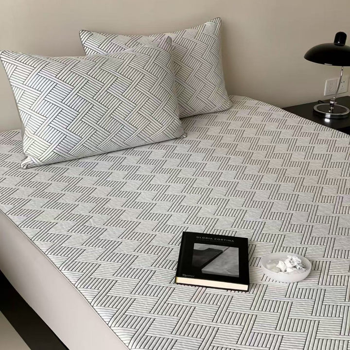 Quilted mattress topper set with non-slip underside, breathable microfiber and pillowcases