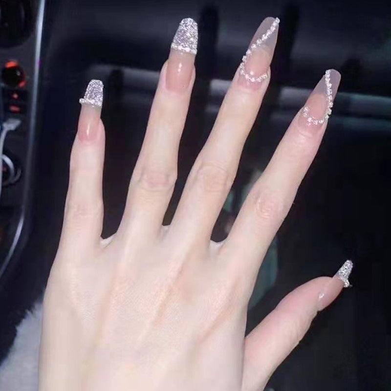 Glamorous artificial nails with heart and glitter design Kalsten